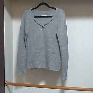 Women's gray sweater.